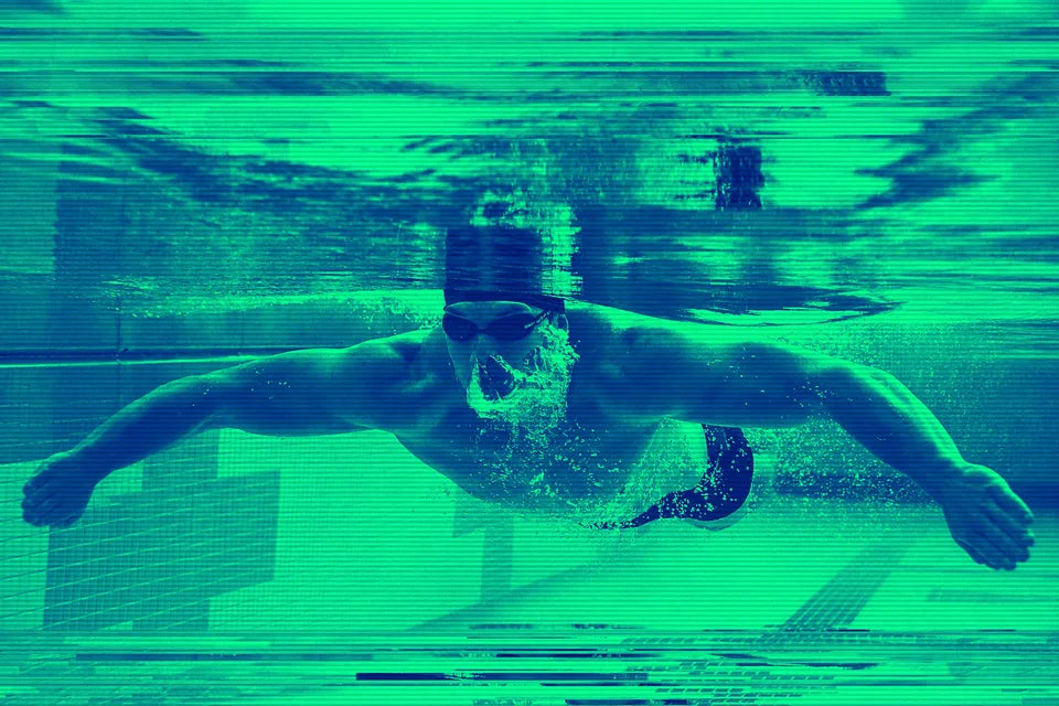 Swimmer driving forward through the water